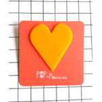yellow oversized heart brooch by Pop-a-porter