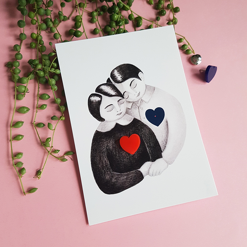 The lovers, an illustrated card with a jewel