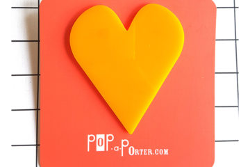 yellow oversized heart brooch by Pop-a-porter