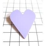 make a statement with a bold, funny heart brooch